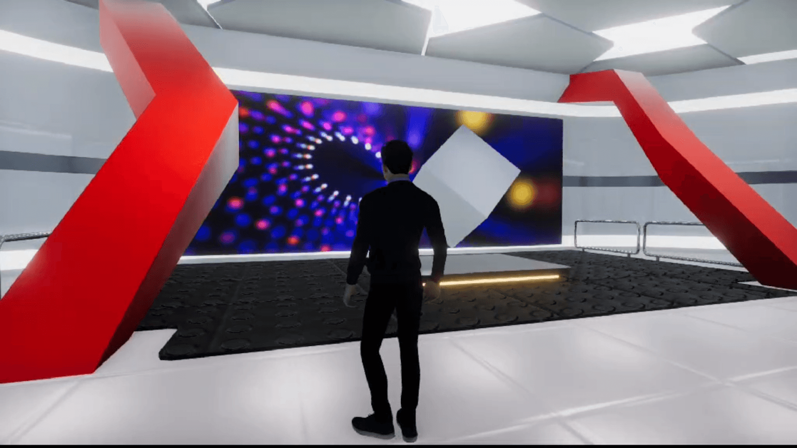 A user standing before a large interactive display screen inside the Nepverse virtual exhibition hall